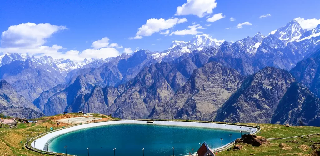 Auli, Uttarakhand place to visit in India mountains covered by clouds